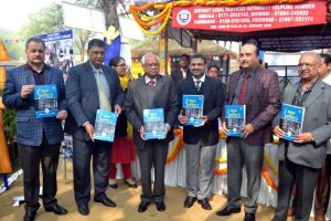 Students from Faculty of Law are guiding visitors about e-courts at the Suraj kund Crafts Mela 2019